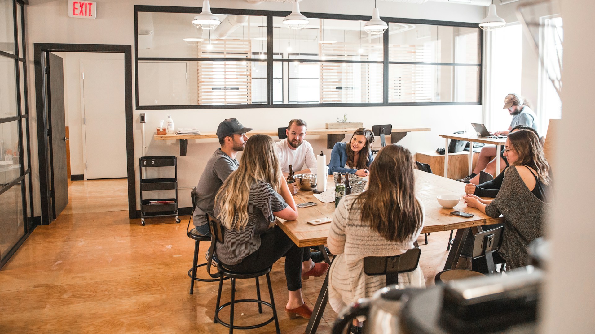 Startup founders collaborating in modern workspace