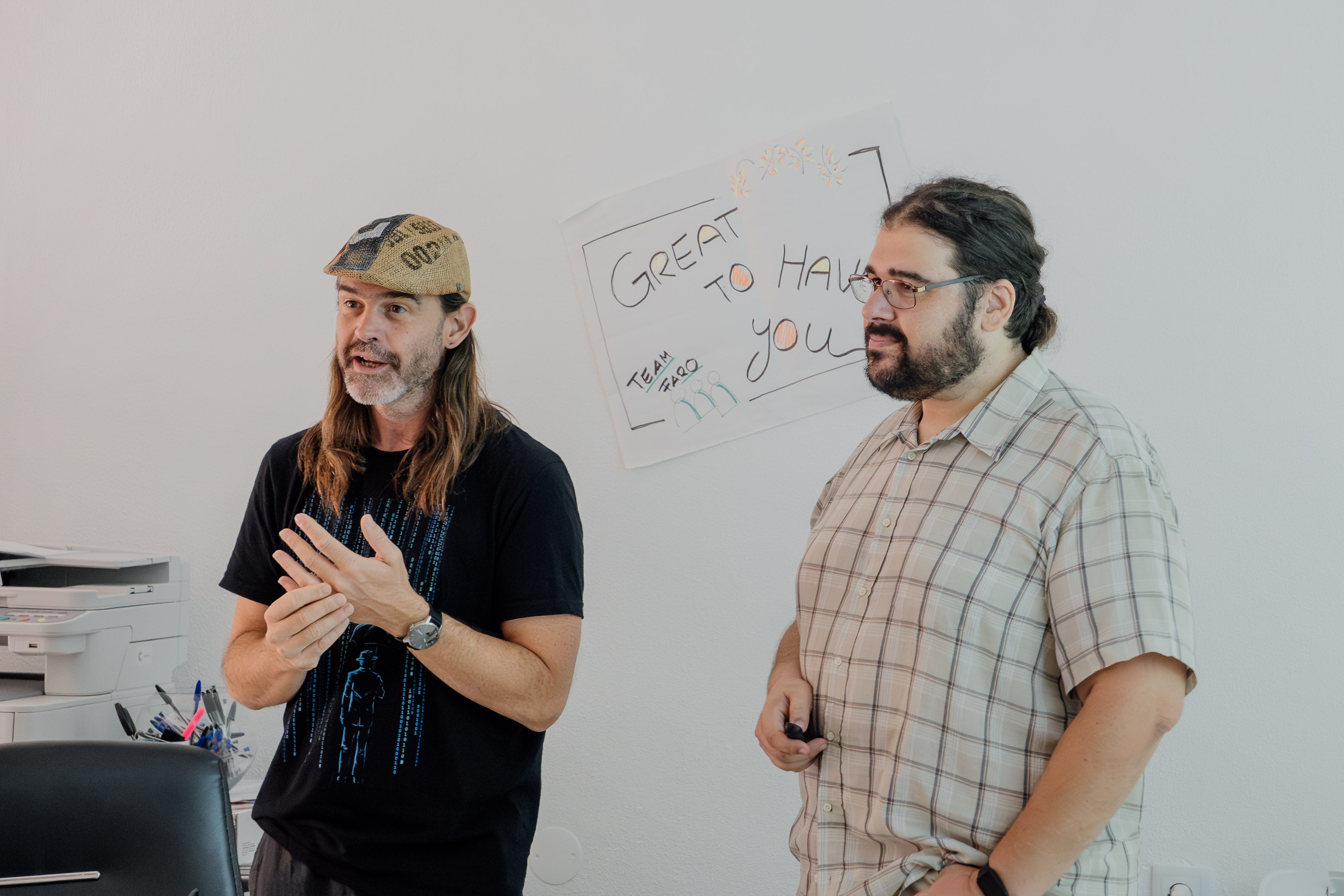 Startup founders collaborating in modern workspace